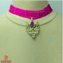 Load image into Gallery viewer, Tribal Beaded Necklace With Dangling Motif