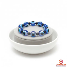 Load image into Gallery viewer, Turquoise & Lapis Beaded Necklace and Evil Eye Bracelet