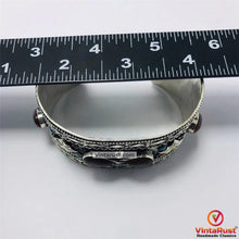 Load image into Gallery viewer, Vintage Tribal Boho Cuff inlaid With Brown Stones
