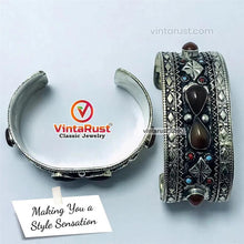 Load image into Gallery viewer, Vintage Tribal Boho Cuff inlaid With Brown Stones
