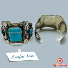 Load image into Gallery viewer, Tribal Stone Cuff Bracelet With Turquoise and Coral Beads
