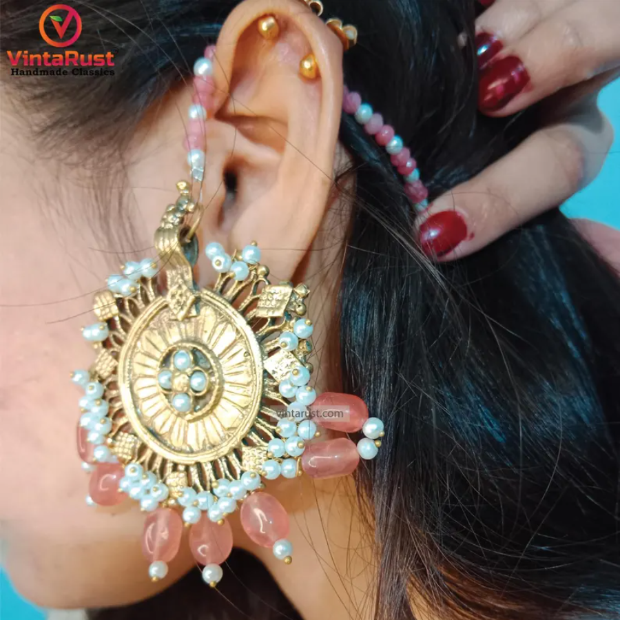 Golden Dangling Earrings with Pearl Embellishments and Pink Bead Details