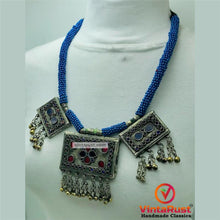 Load image into Gallery viewer, Tribal Blue Beaded Necklace With Dangling Pendant
